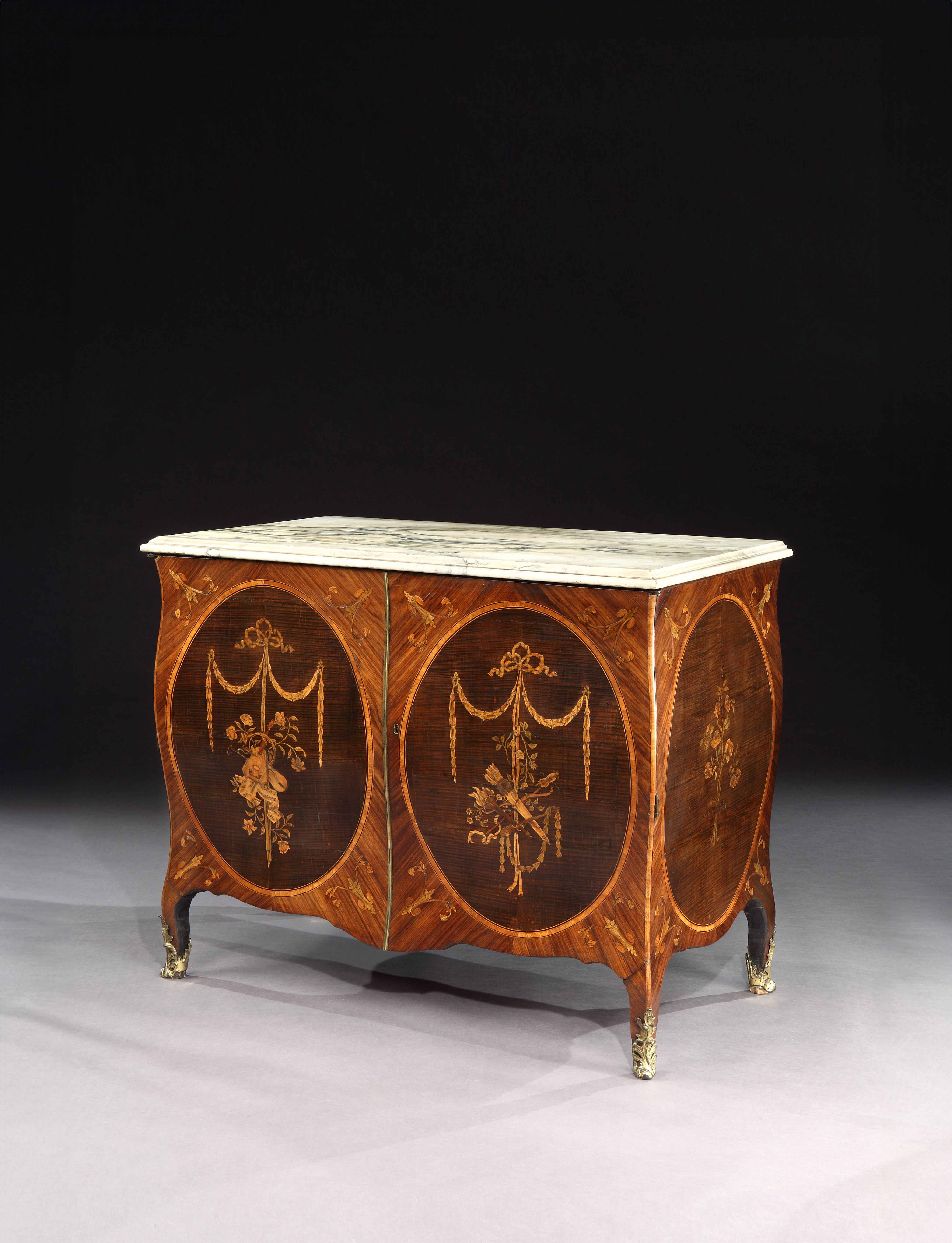 An Exceptional Pair of George III Marquetry Bombe Commodes Attributed to Mayhew and Ince